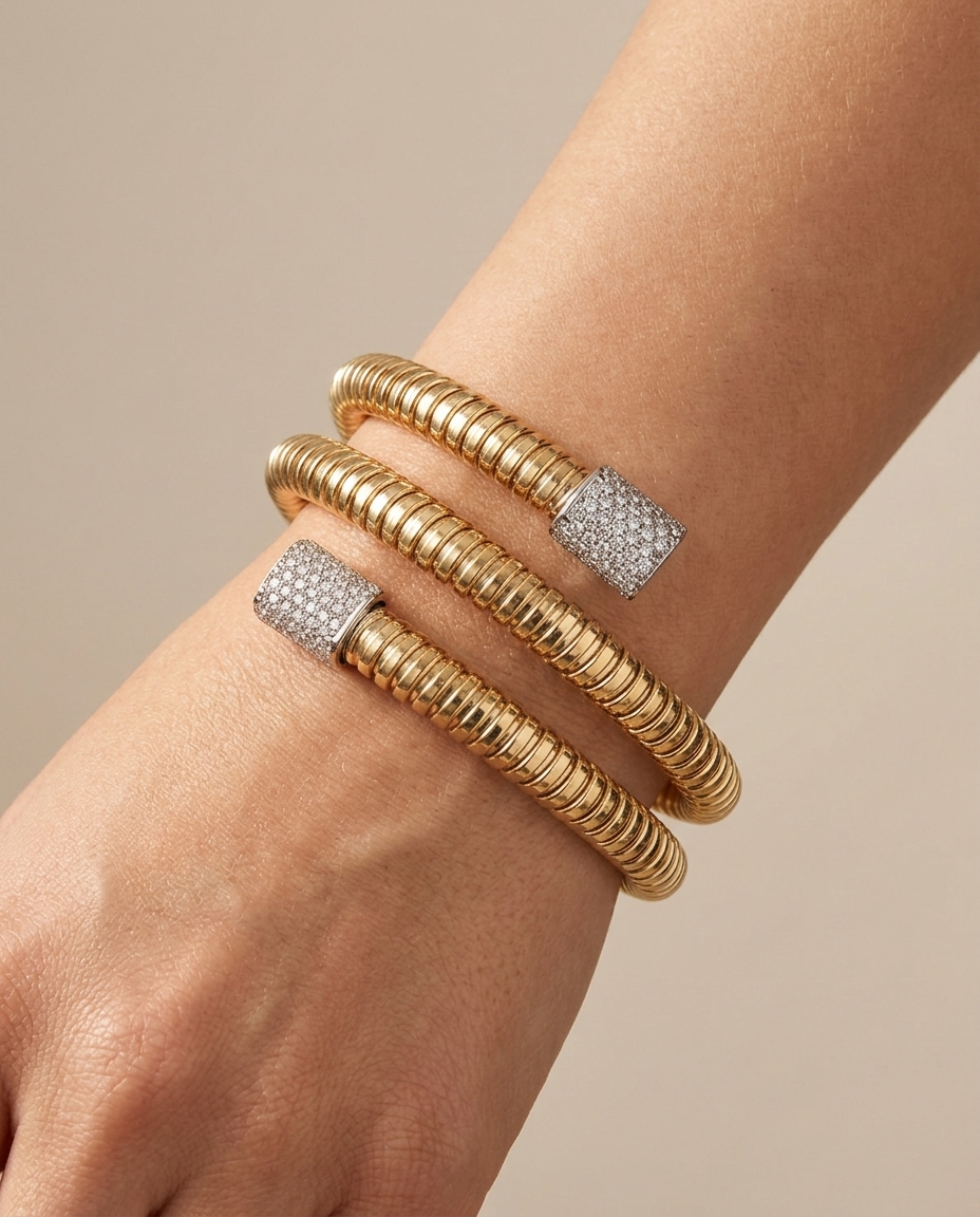 14KT Italian Yellow Gold Tubogas Bangle with Diamonds on model