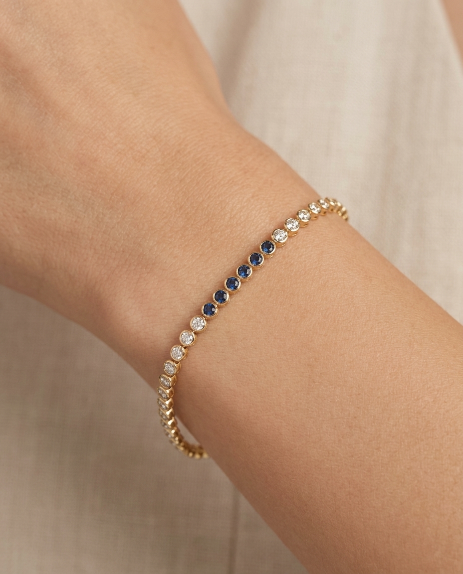 14KT Yellow Gold Diamonds and Blue Sapphire Tennis Bracelet on model