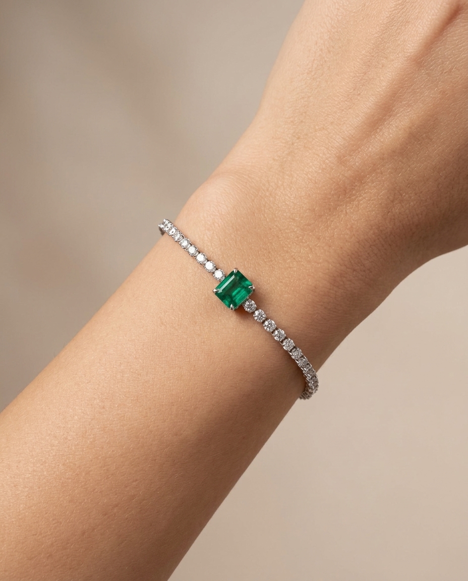 14KT White Gold Emerald Oct and Diamond Tennis Bracelet on model