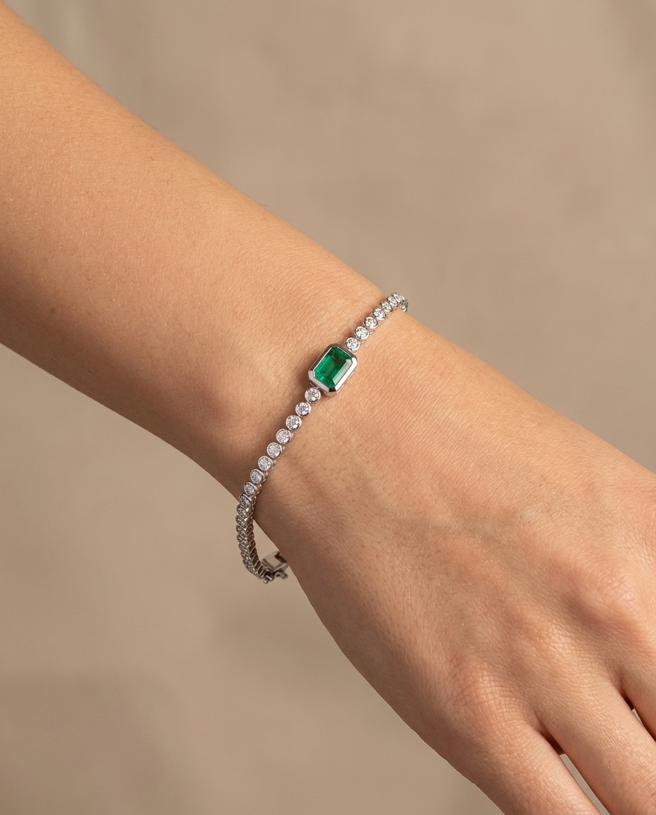 14KT White Gold Emerald Oct and Diamond Tennis Bracelet on model