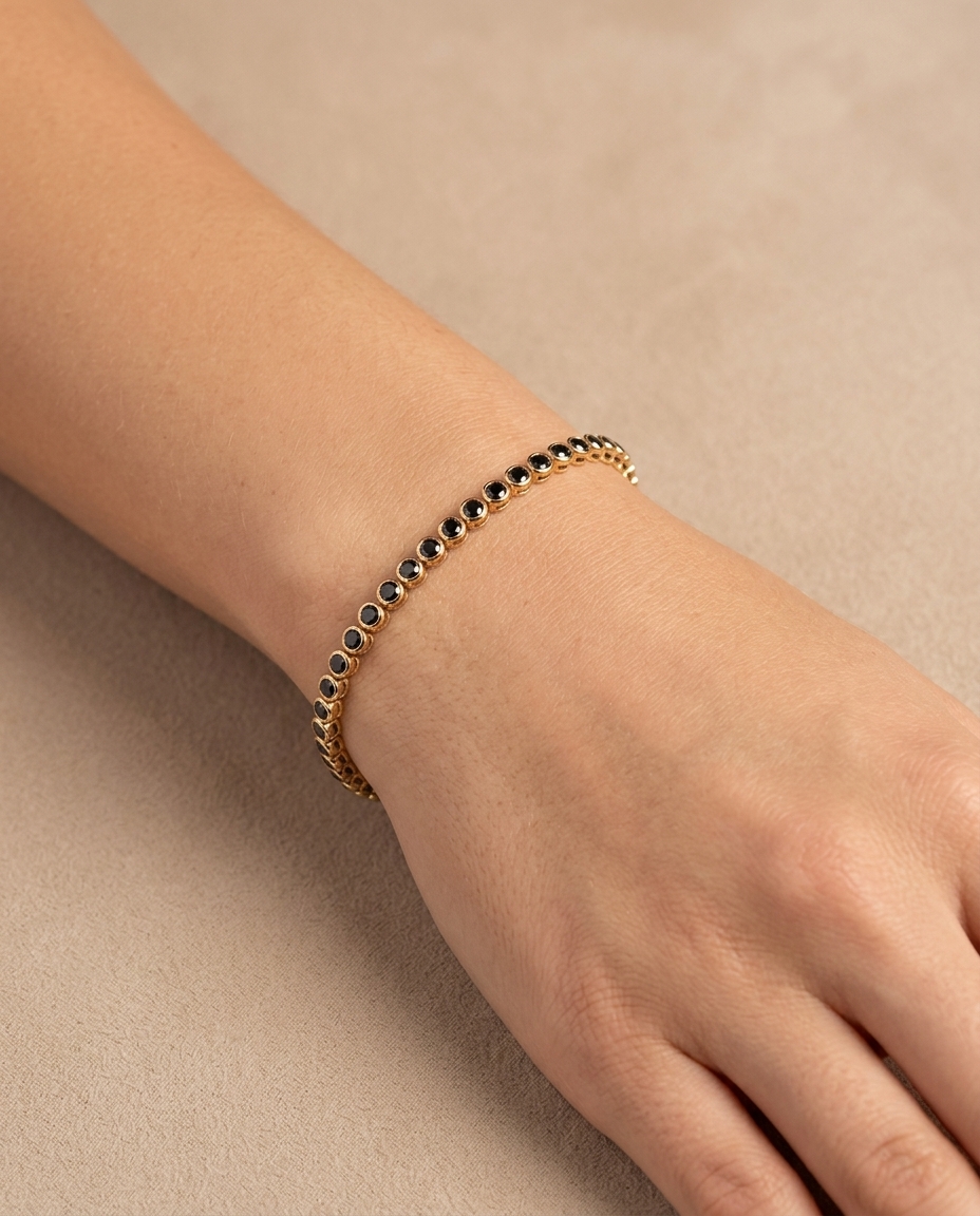 14KT Yellow Gold Black Diamond Bezel Tennis Bracelet on model