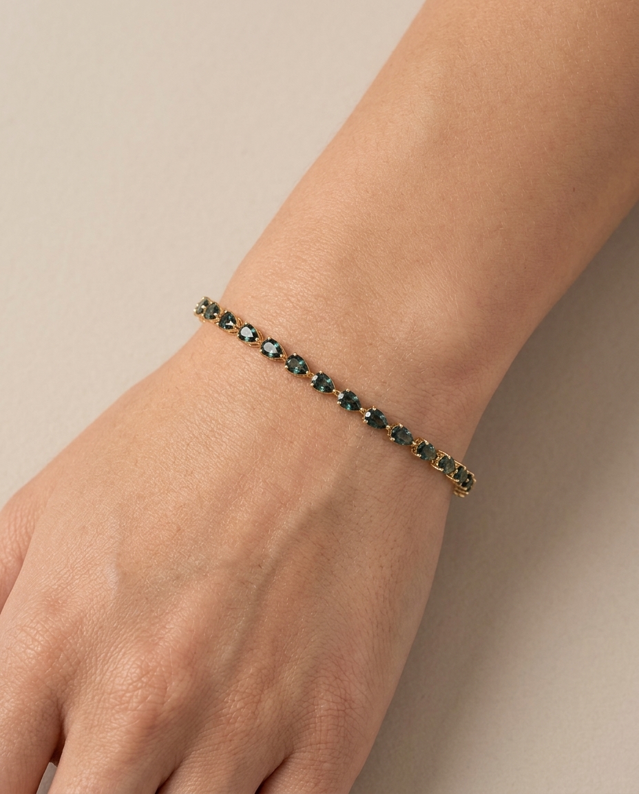 14KT Yellow Gold Pear Shape Green/Blue Sapphire Bracelet on model