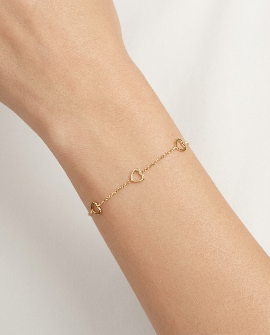 14KT Yellow Gold Heart Bracelet 7" on model