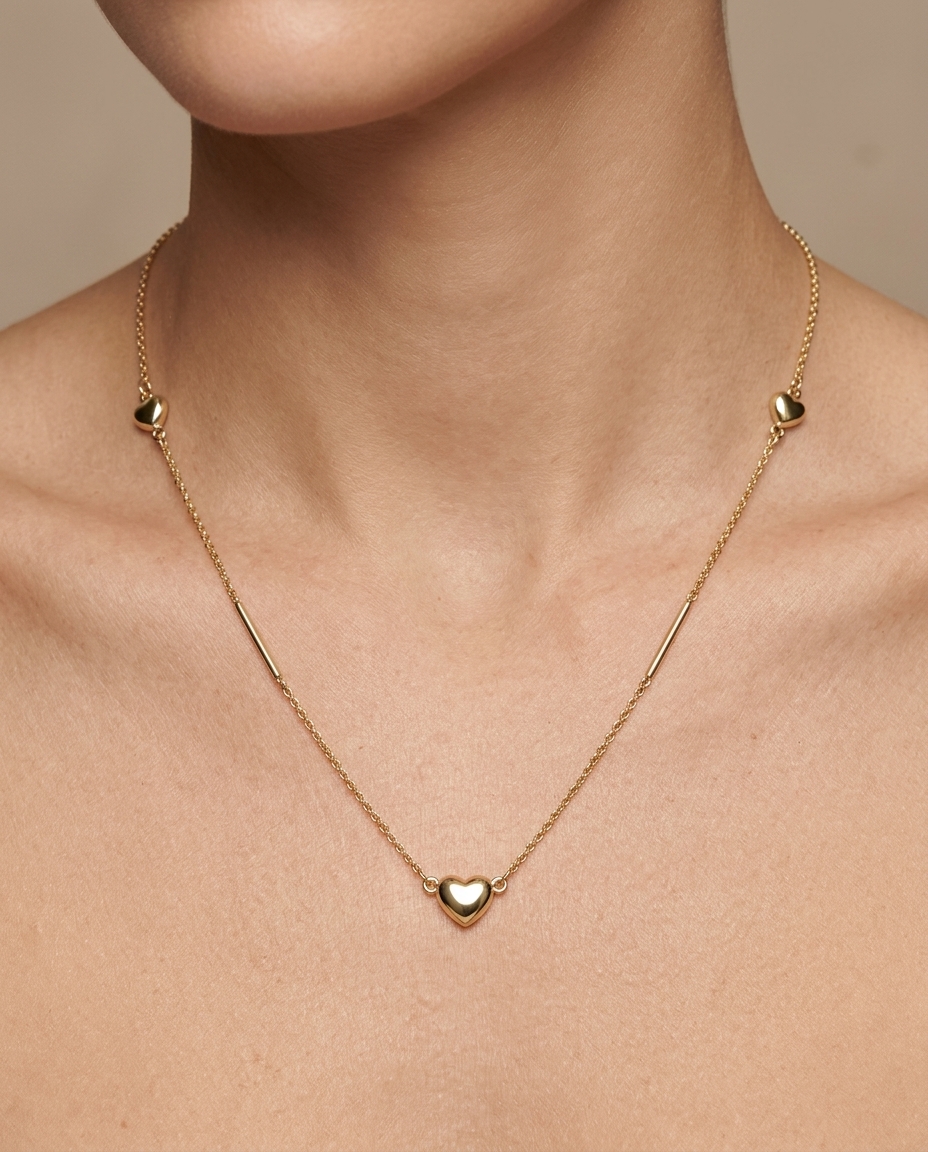 14KT Gold Heart Station Necklace on model