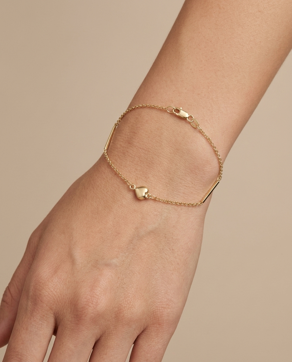 14KT Gold Heart Bracelet on model