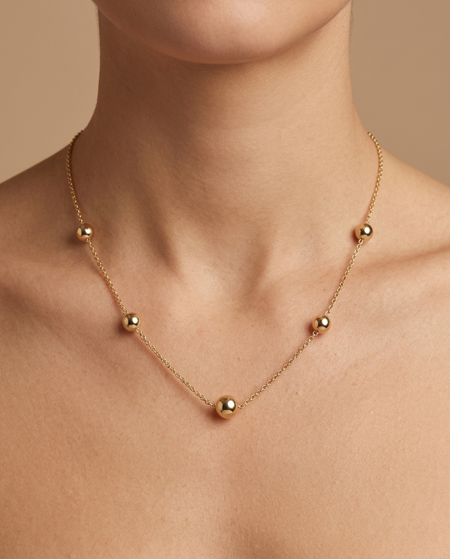 14KT Gold Round Station Necklace on model