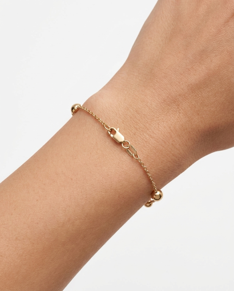 14KT Yellow Gold Circle Braclet 7" on model