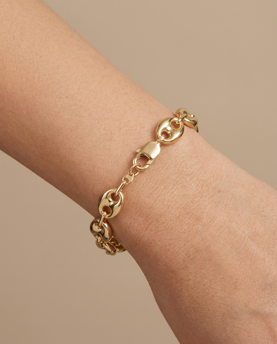 14KT Yellow Gold Hollow Puff Mariner Bracelet 7" on model