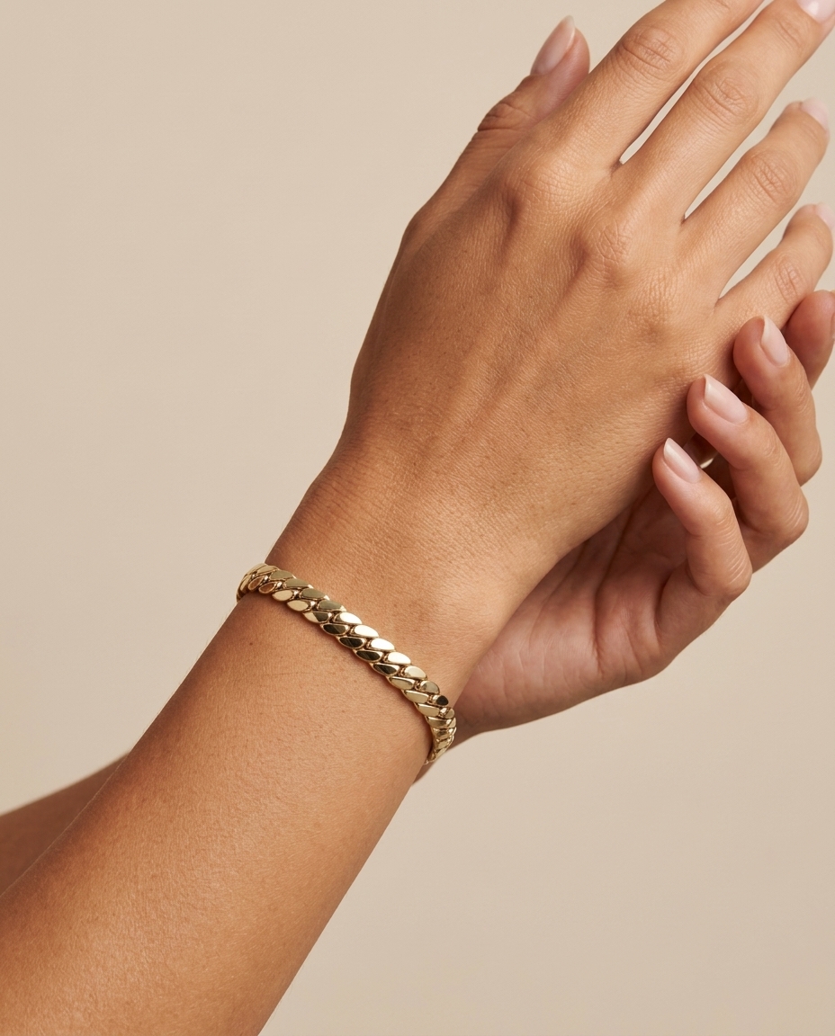 14KT Yellow Gold Hollow Cuban Bracelet 7.5" on model