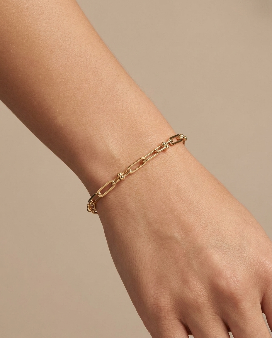 14KT Yellow Gold U-Link with Paperclip 7.5" Bracelet on model