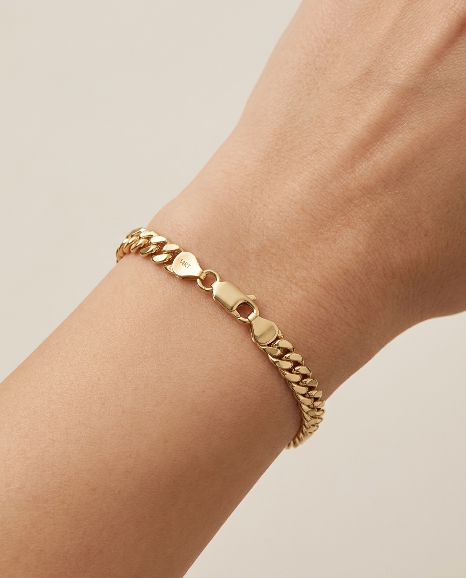 14KT Gold Cuban (5.5MM) Bracelet on model