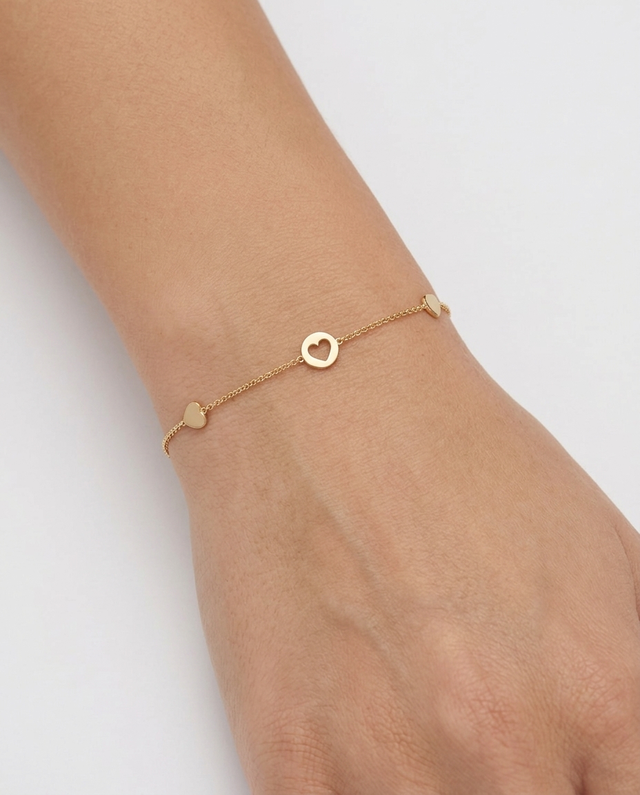 14KT Yellow Gold Heart Braclet 7" on model