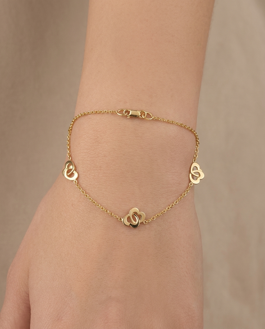 14KT Yellow Gold Heart Braclet 7" on model