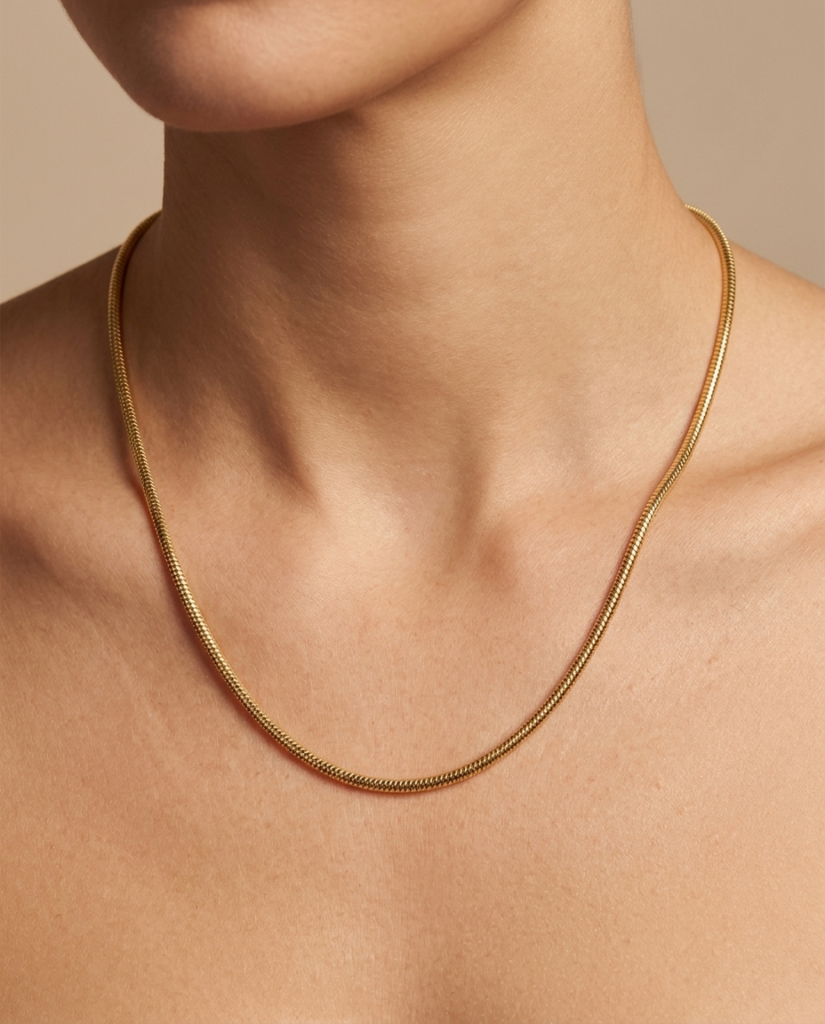 14KT Gold Round Snake Chain Necklace on model