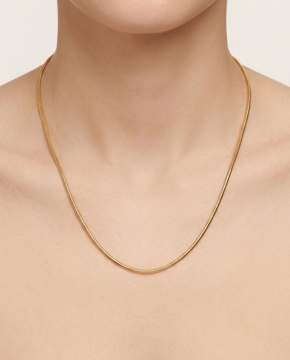 14KT Gold Round Snake Chain Necklace on model