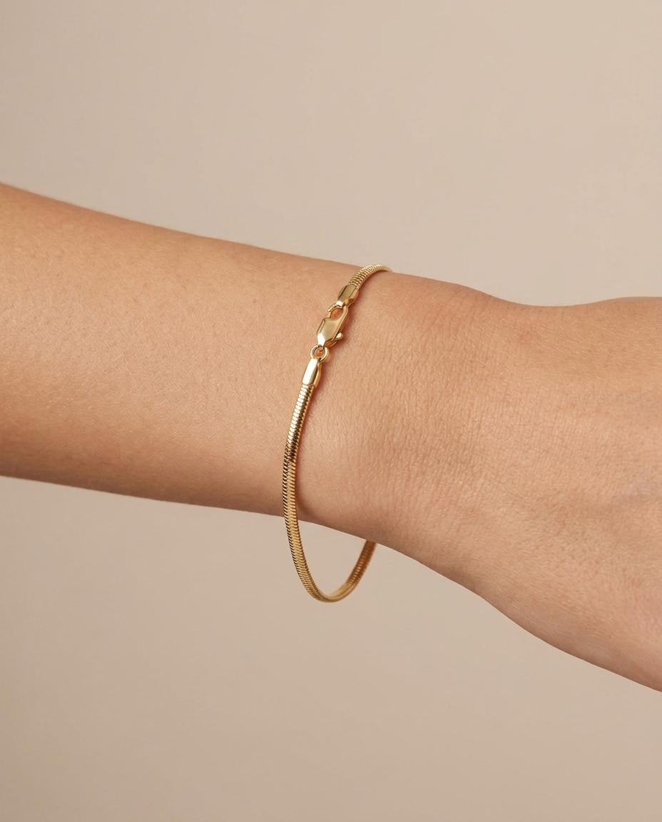 14KT Gold Round Snake Bracelet on model