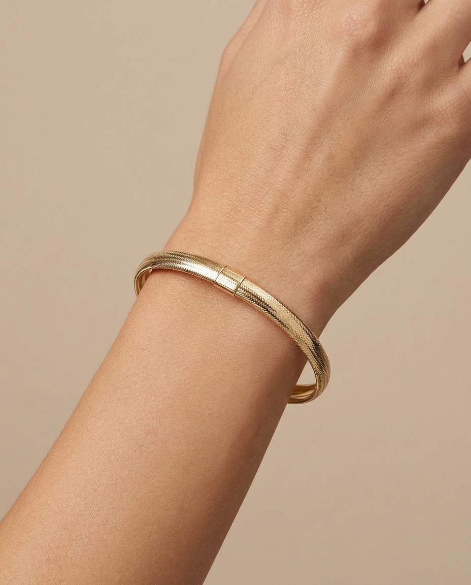 14KT Gold Stretch Bangle on model