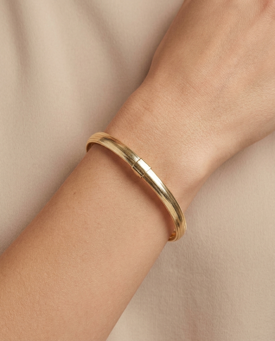 14KT Gold Stretch Bangle on model