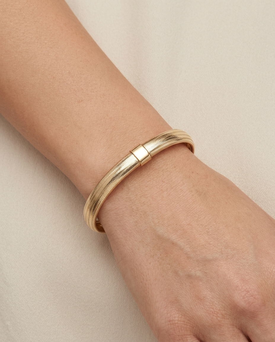 14KT Gold Stretch Bangle on model