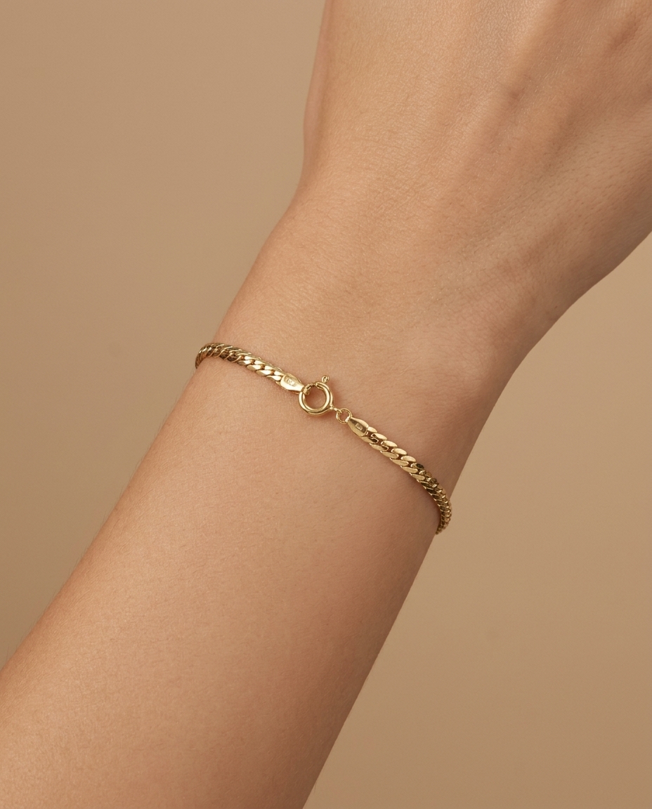 14KT Gold Cuban Chain Bracelet on model