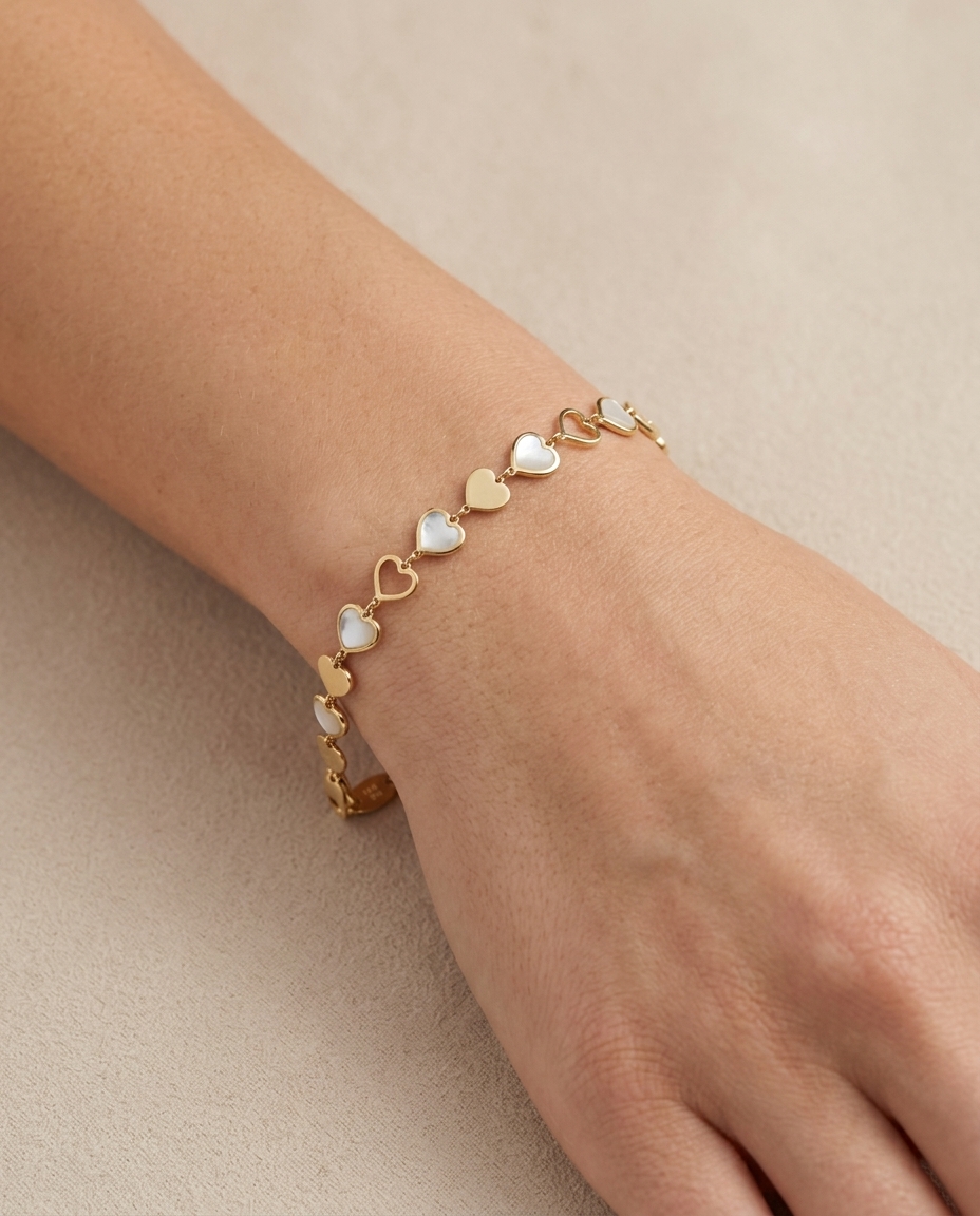 14KT Gold Mother of Pearl Heart Bracelet on model