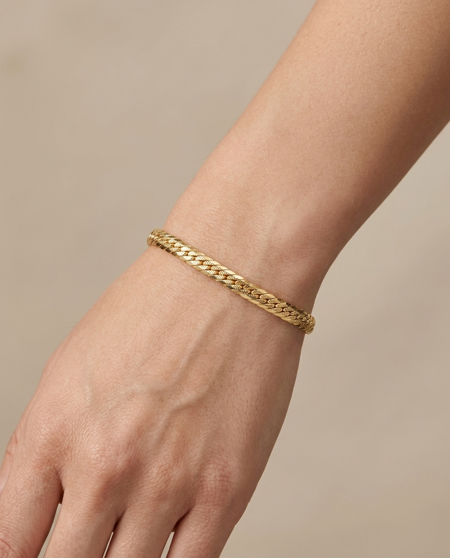 14KT Yellow Gold Flat Cuban Bracelet on model