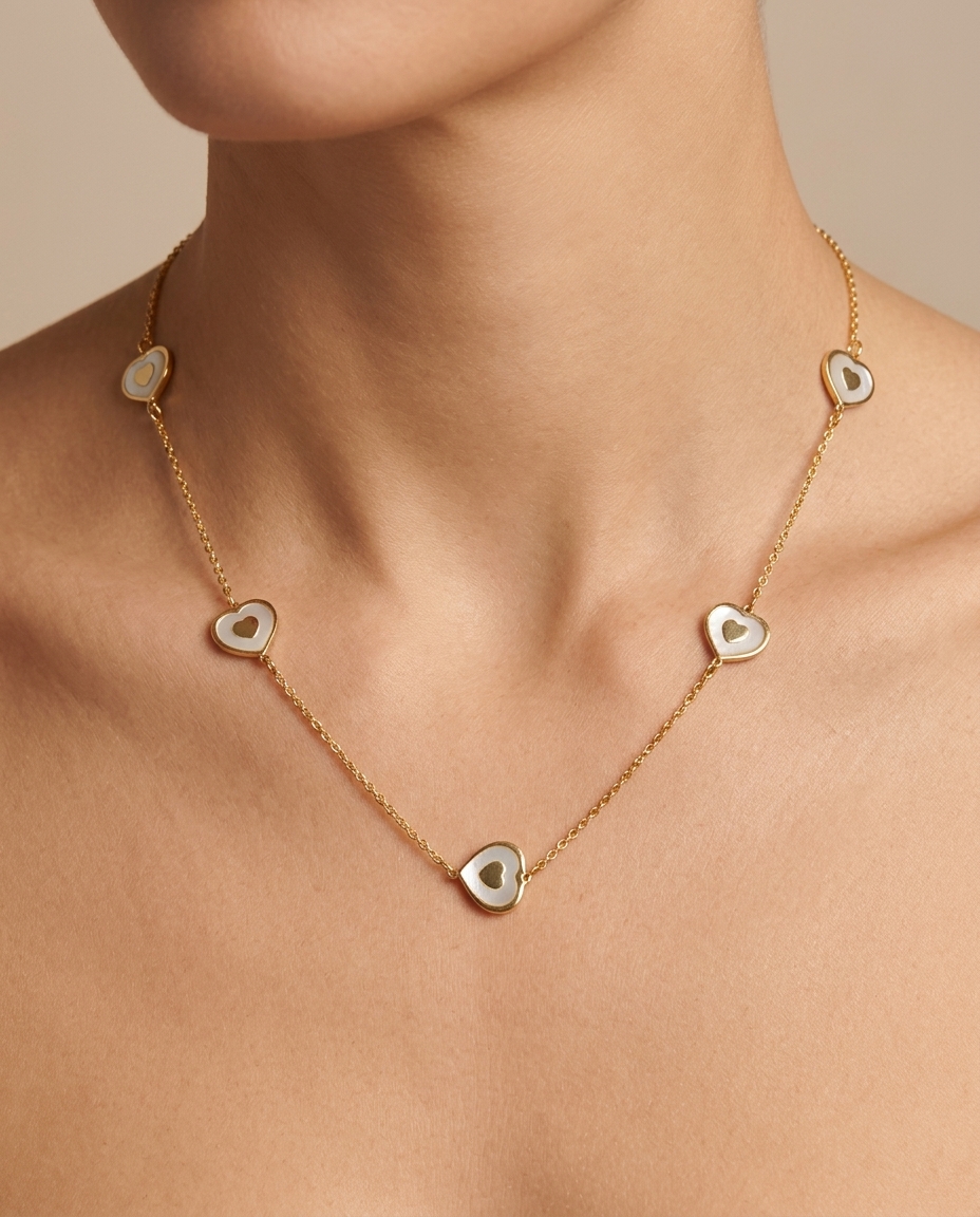 14KT Yellow Gold Mother of Pearl Heart Necklace on model