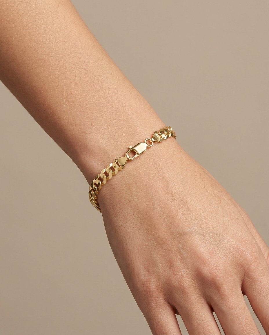 14KT Yellow Gold Flat Cuban Bracelet on model