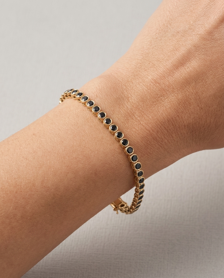 14KT Yellow Gold Black Diamond Bezel Tennis Bracelet on model