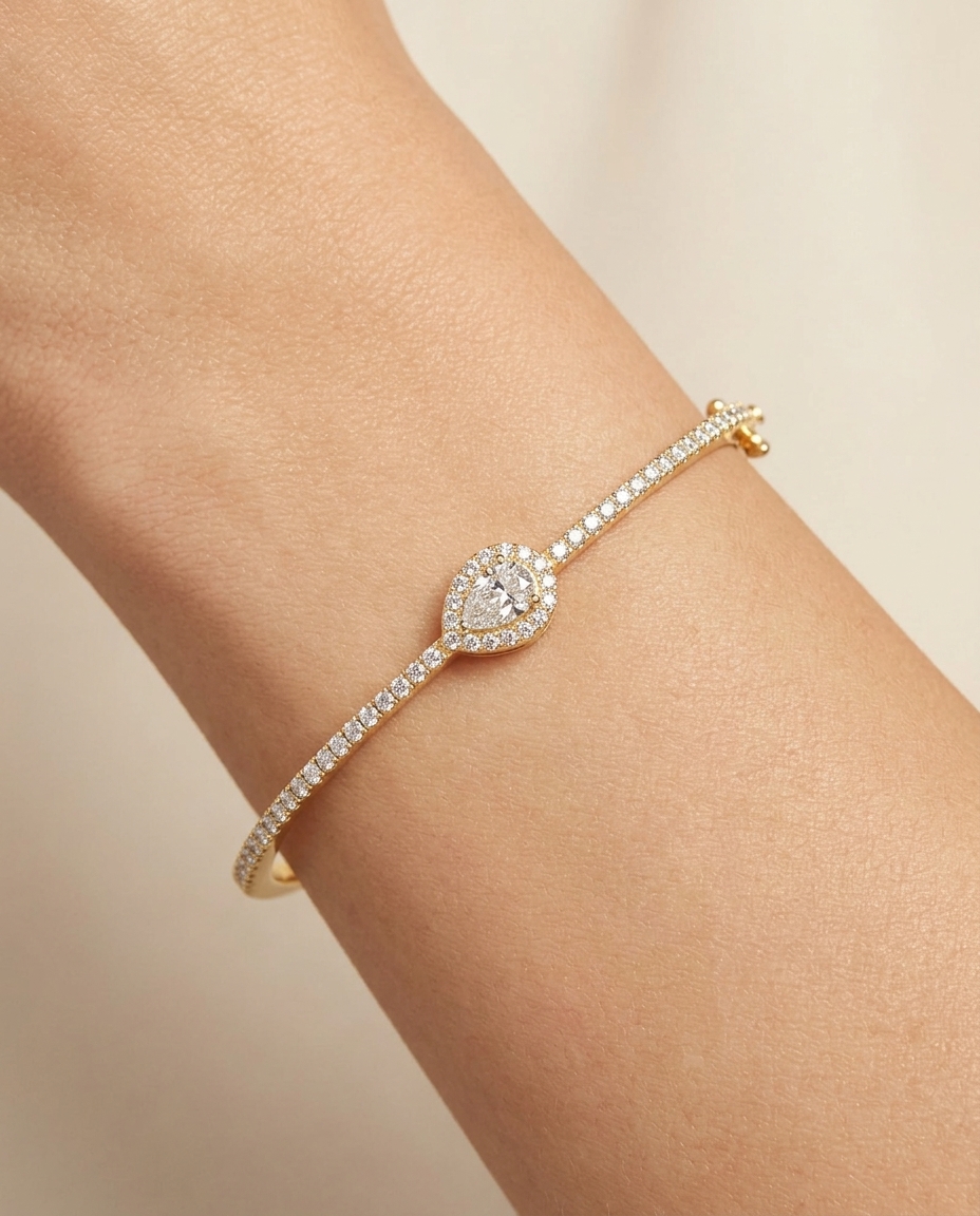 14KT Yellow Gold Pear Shape Diamond Bangle on model
