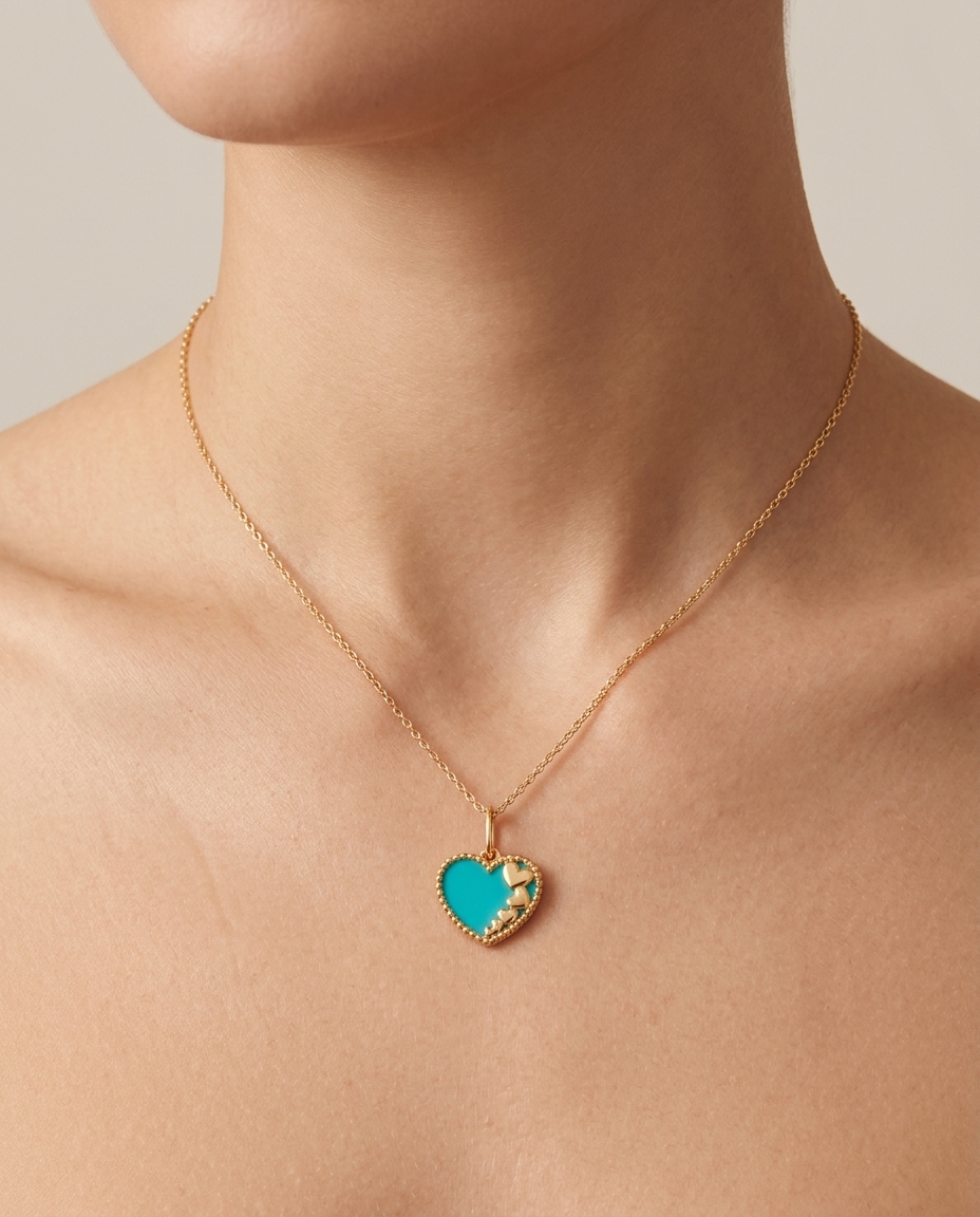 Turquoise Heart Pendant in Yellow Gold on model