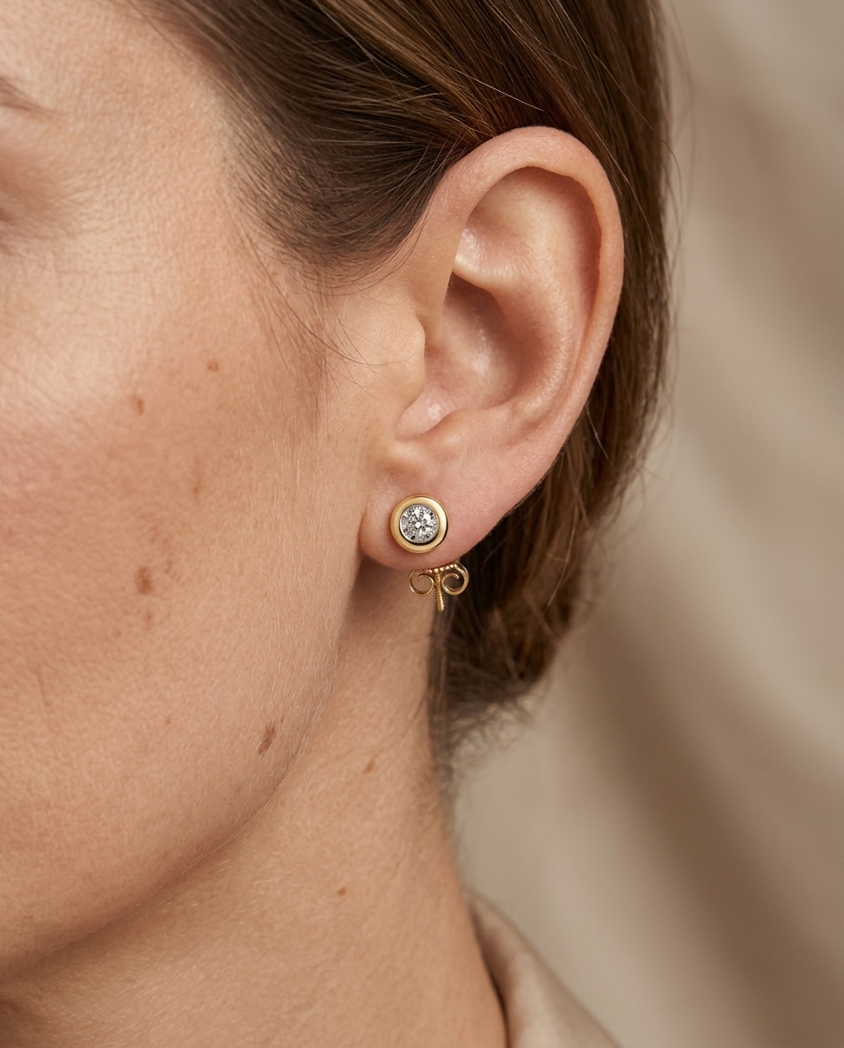 Single Stone Illusion Bezel Earrings in Yellow Gold on model