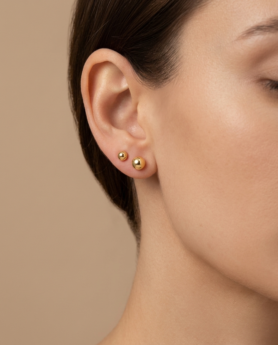 Ball Earring in Yellow Gold on model