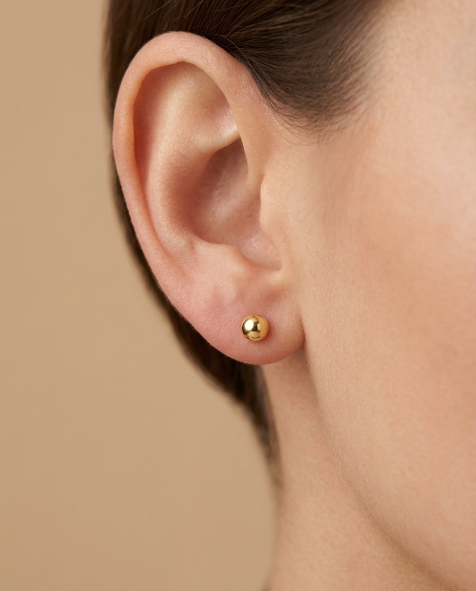 Ball Earring in Yellow Gold on model