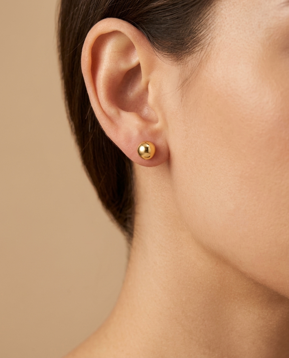 Ball Earring in Yellow Gold on model