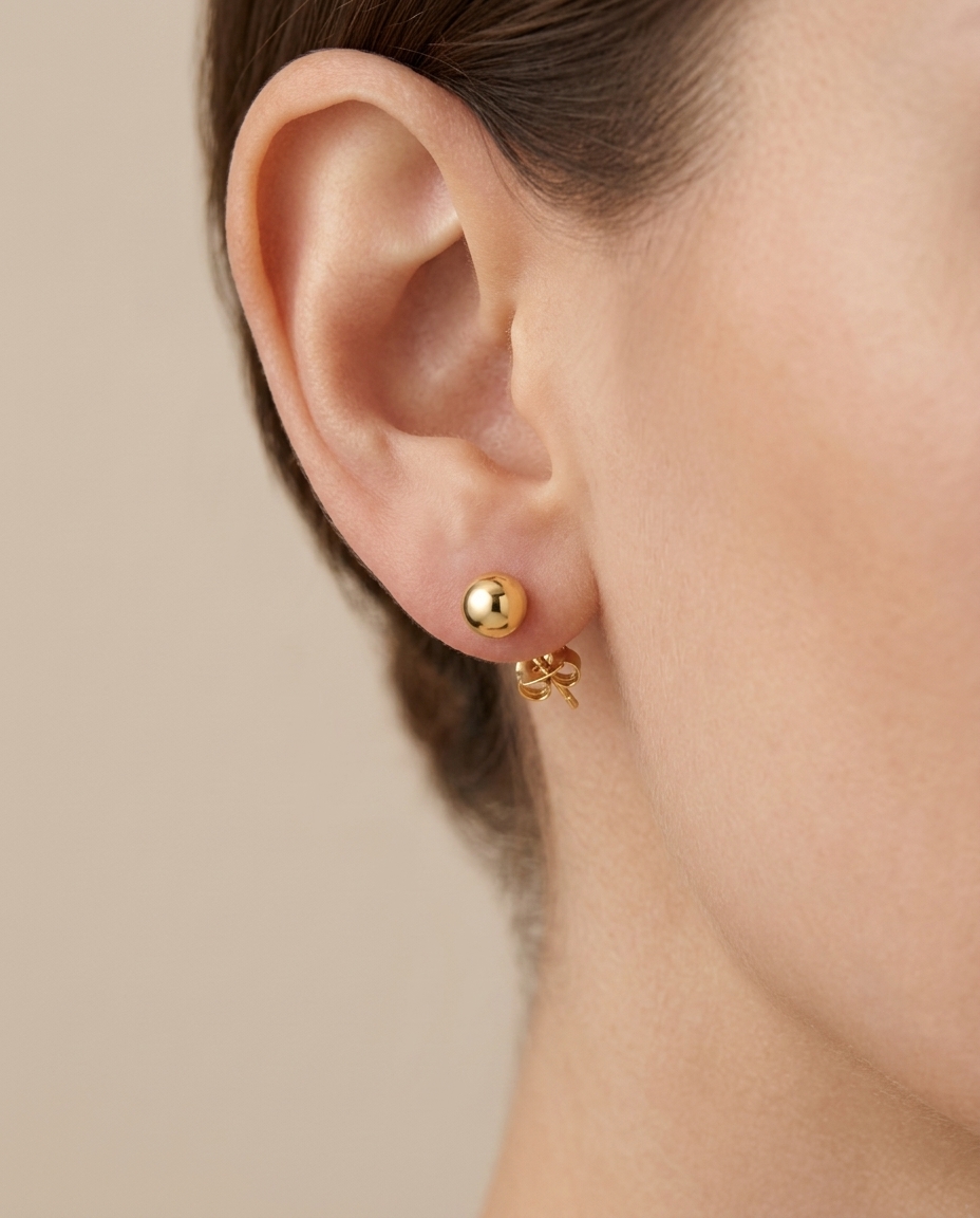 Ball Earring in Yellow Gold on model
