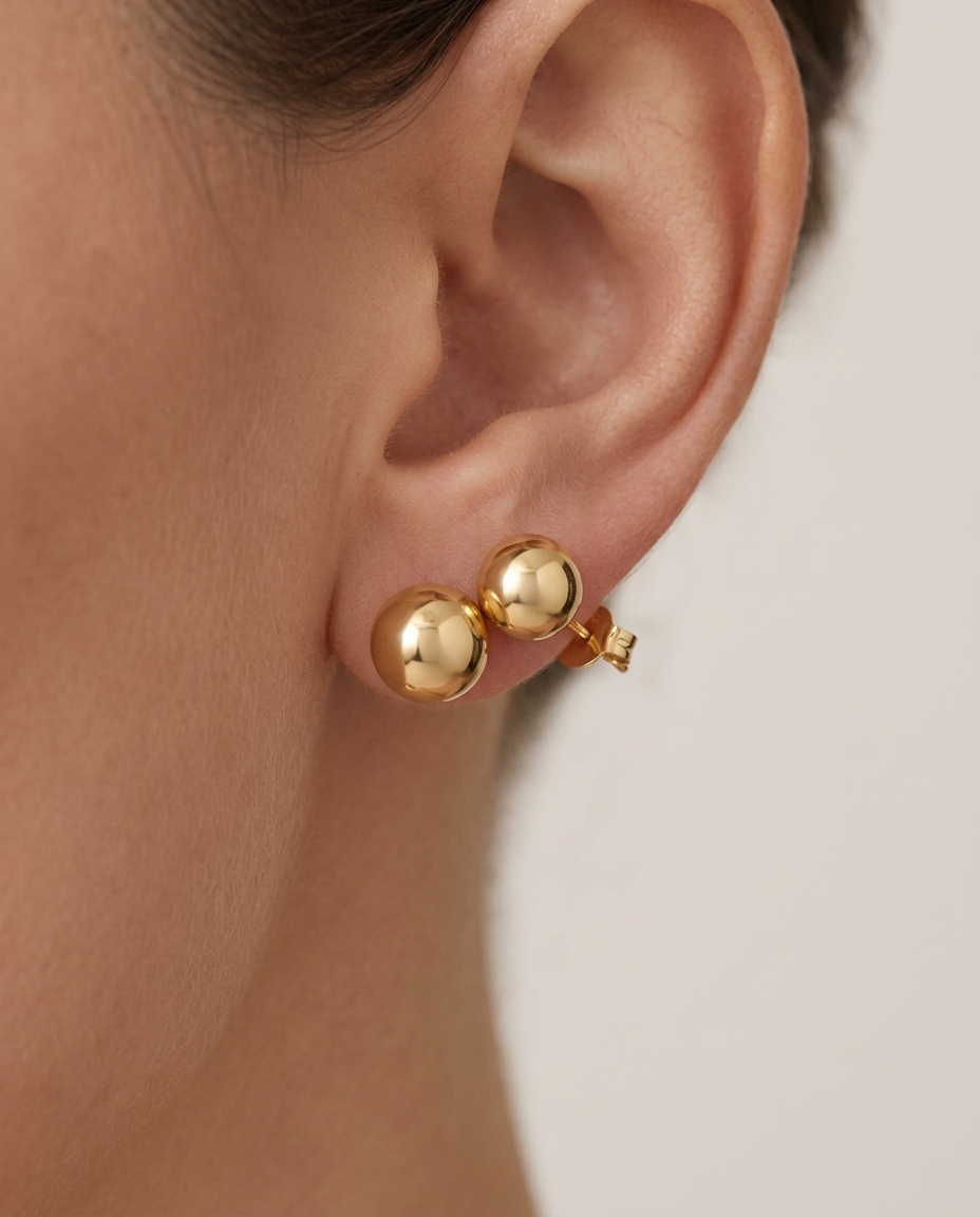 Ball Earring in Yellow Gold on model