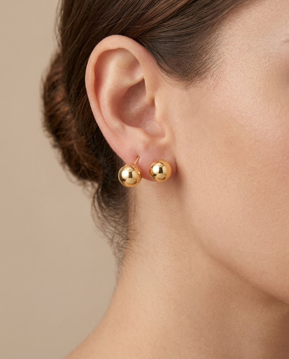 Ball Earring in Yellow Gold on model