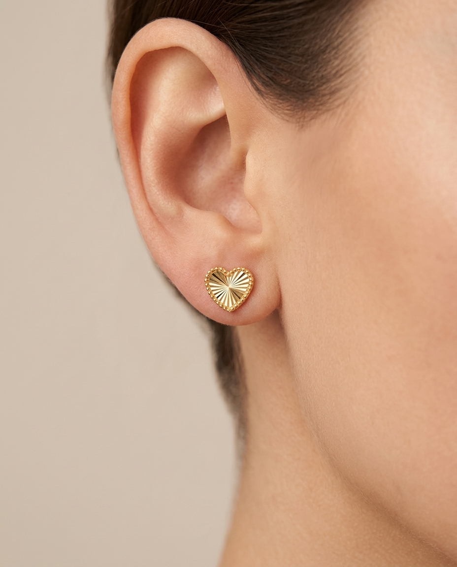 Heart Shape Earrings in Yellow Gold on model
