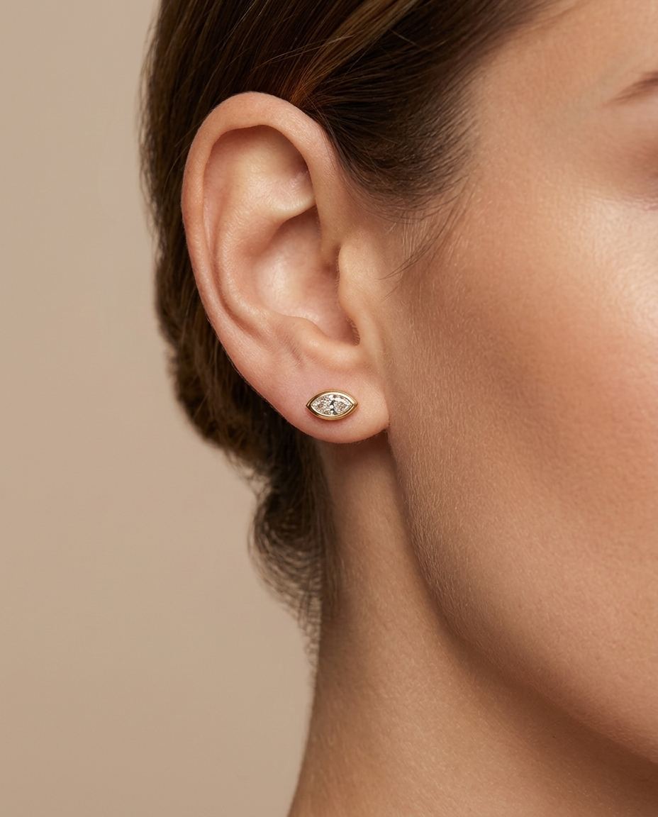 Marquise Diamond Earring . in Yellow Gold on model