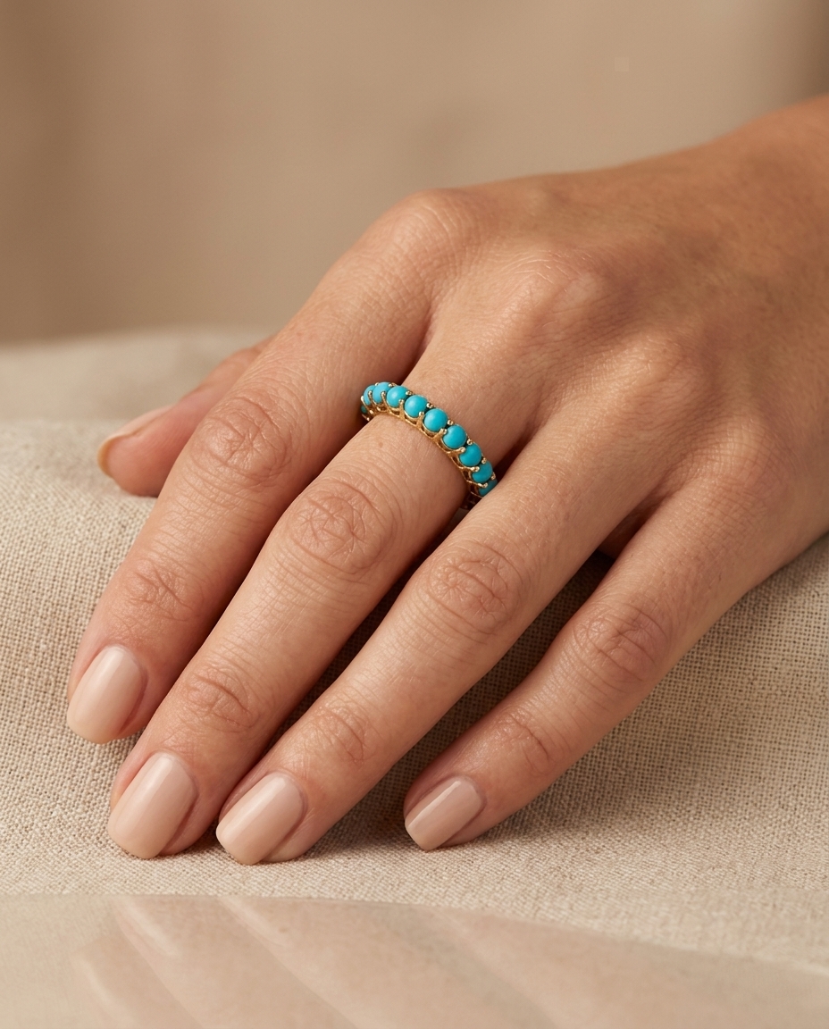 Turquoise Prong Set Eternity Band in Yellow Gold on model
